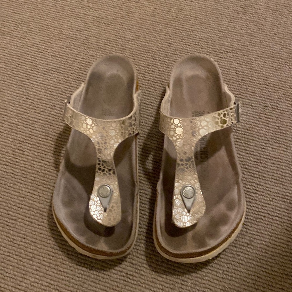 Birkenstock Gizah sz 38. Silver animal print, white soles